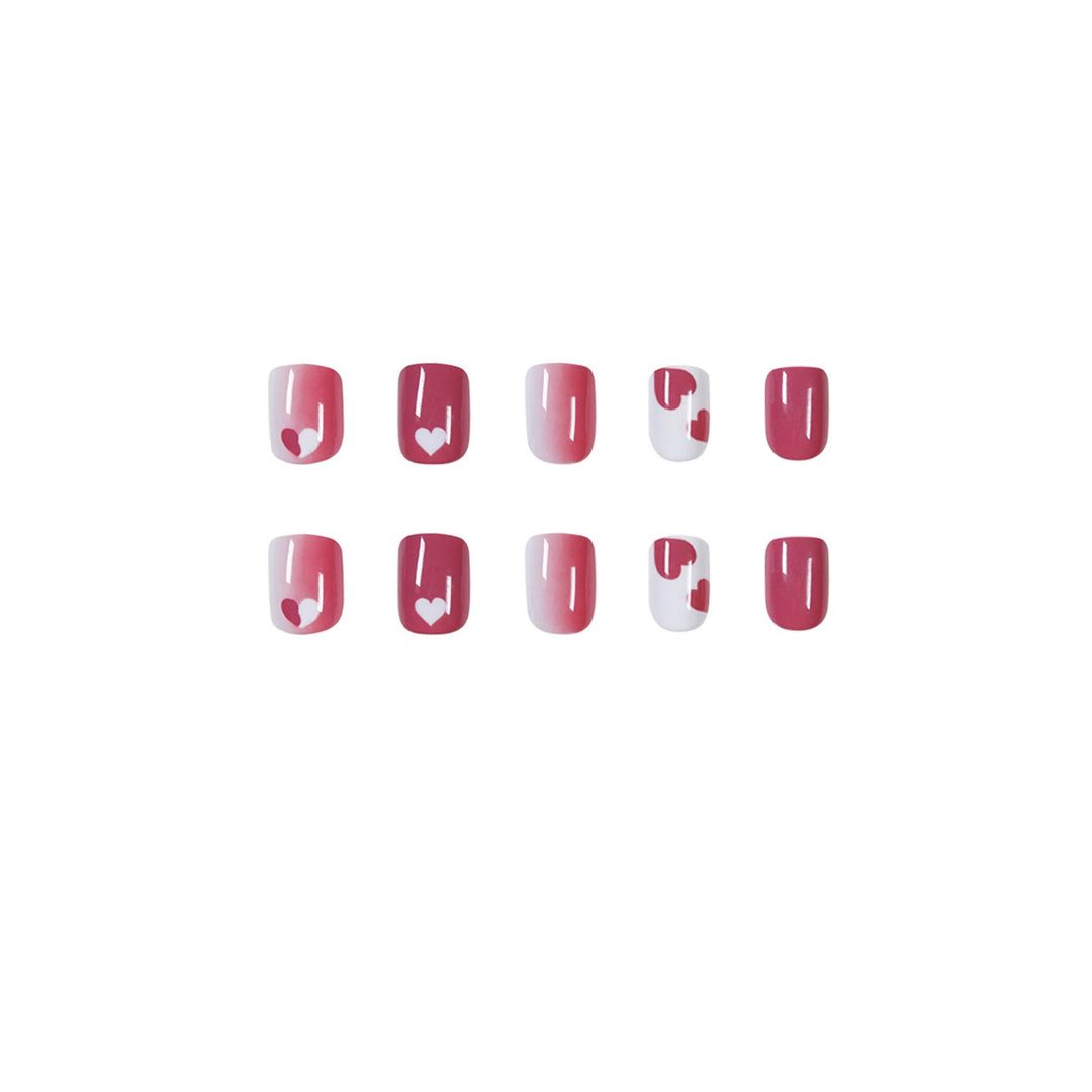Creative nail art with heart motif and high-gloss finish Kalsten
