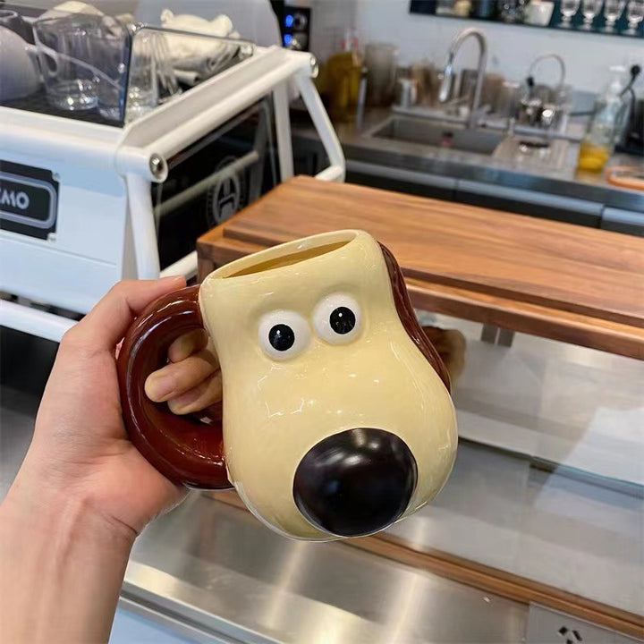 Playful ceramic dog-shaped coffee mug with ergonomic handle