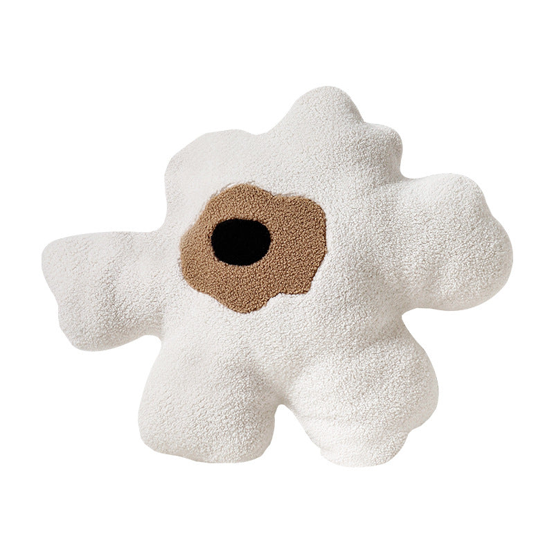 Form cushions made of bouclé with organic sculpture look and contrasting center application