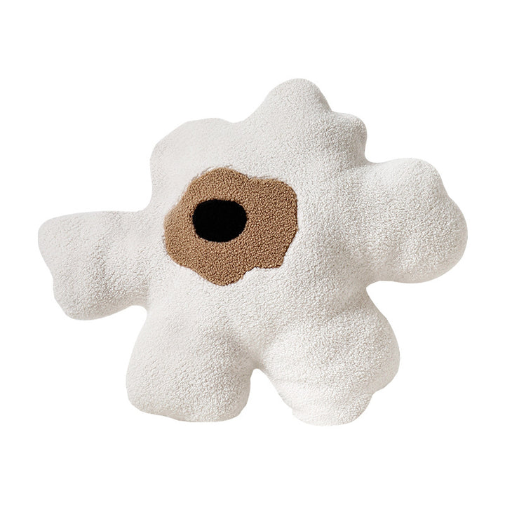 Form cushions made of bouclé with organic sculpture look and contrasting center application