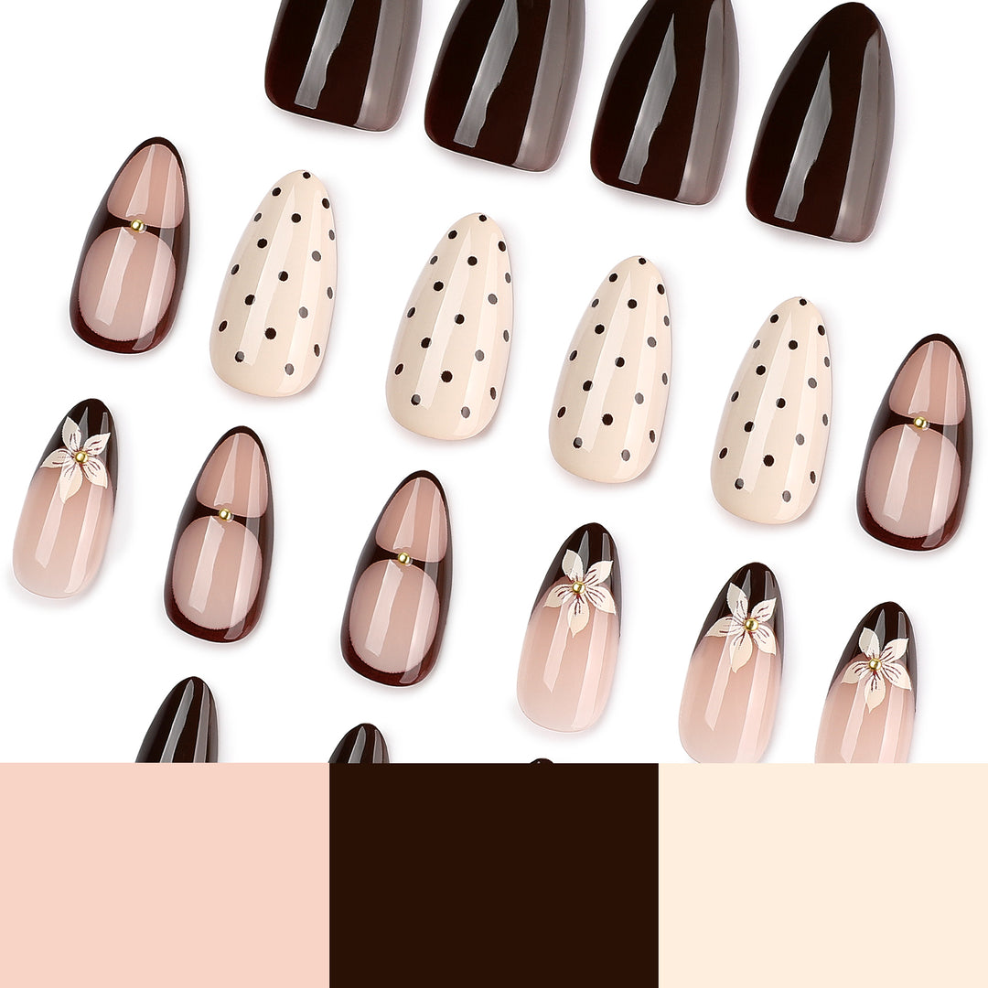 Artful nail design with floral and dot motifs Kalsten