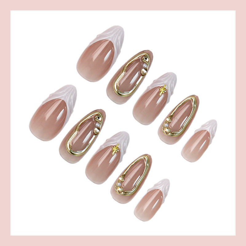 Acrylic nail set with elegant floral designs and glamorous accents Kalsten