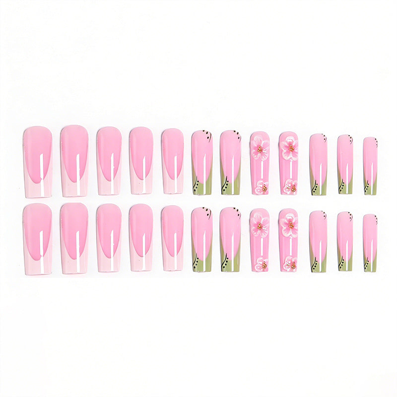 Artful nail tips with floral embellishments Kalsten