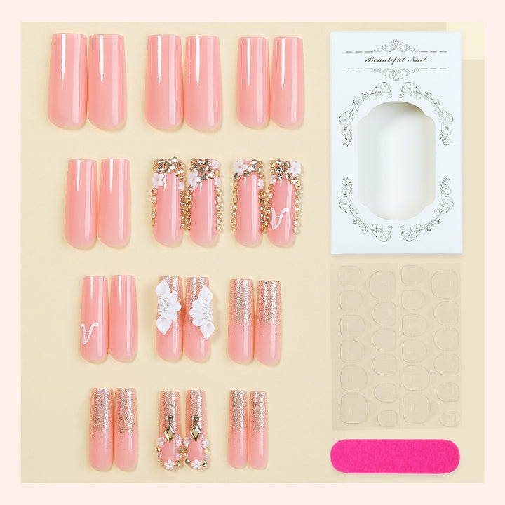 Creative acrylic nail set with delicate flower and gloss embellishments Kalsten