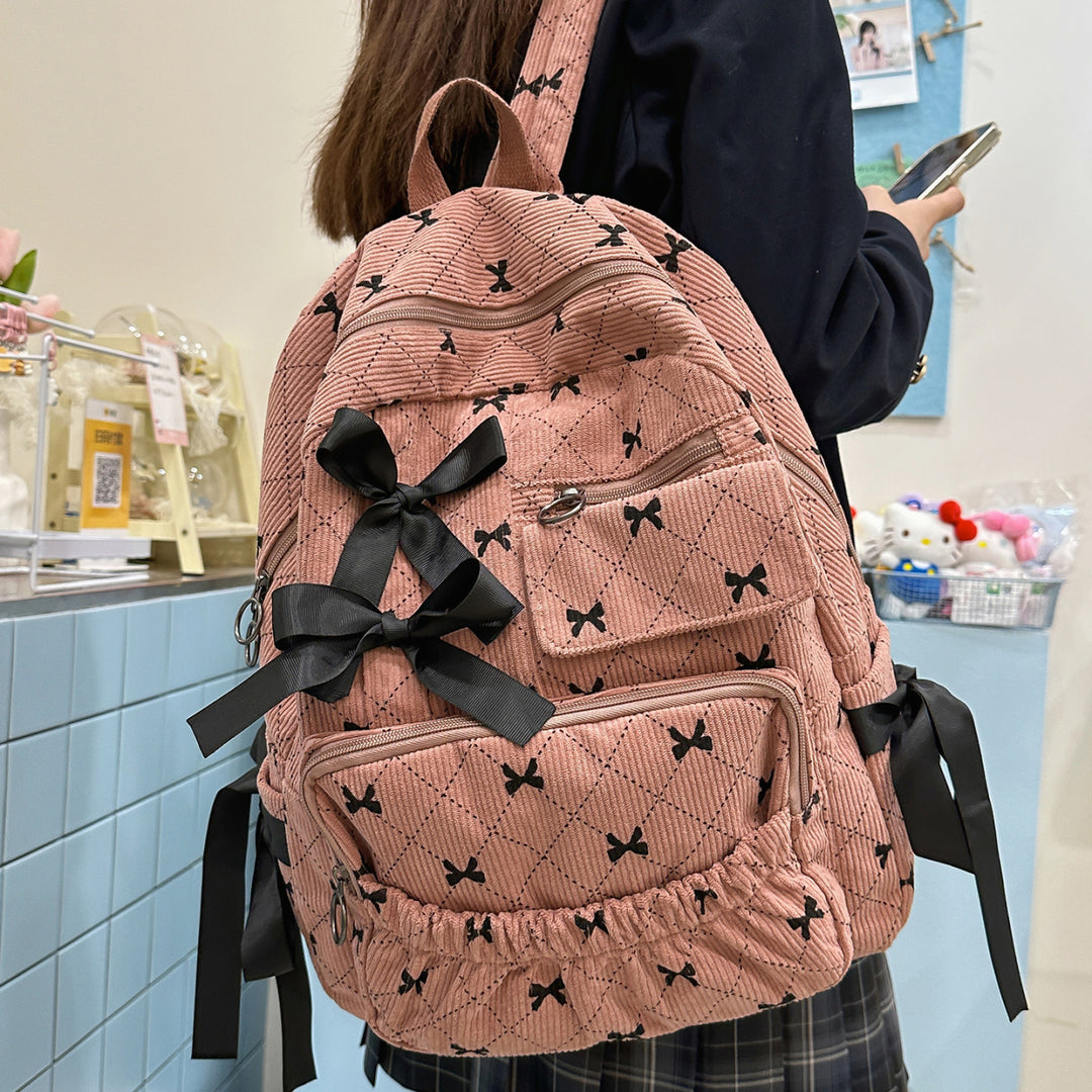 Playful backpack with bow details and practical compartments Kalsten