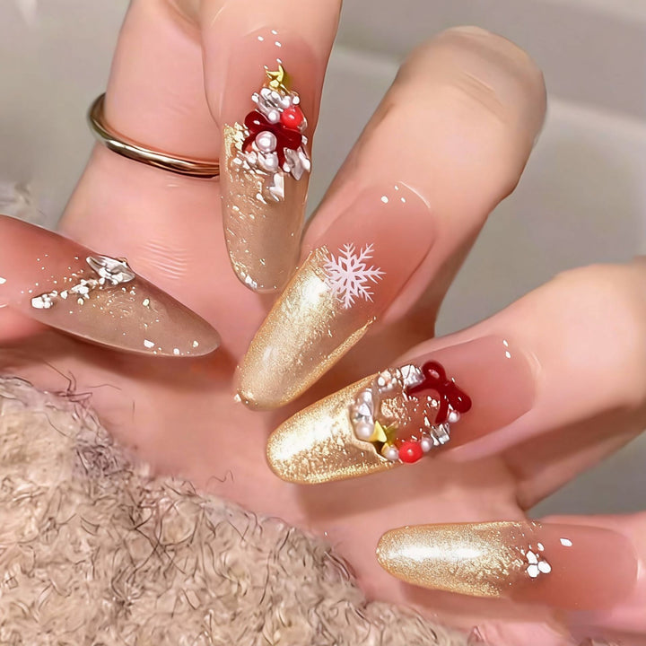 Artificial nail set with festive gift design and elegant glitter accents Kalsten