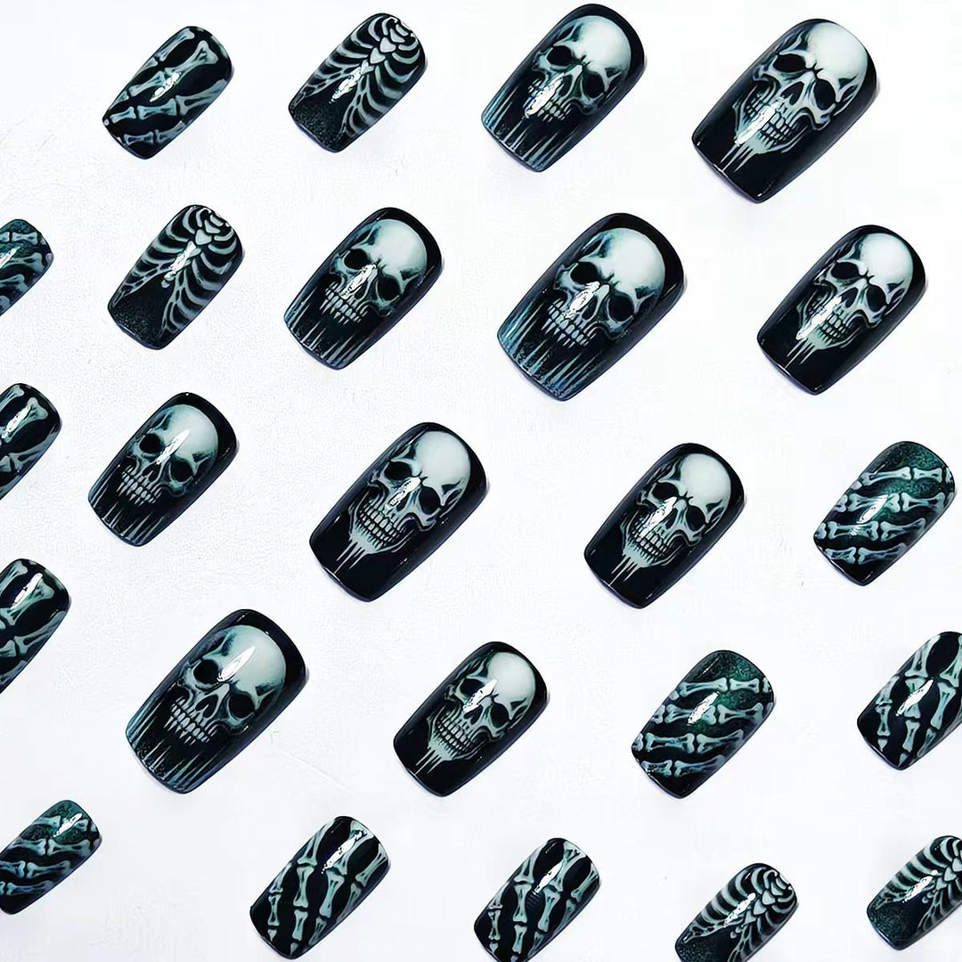 Creative artificial nails in spooky skull design Kalsten