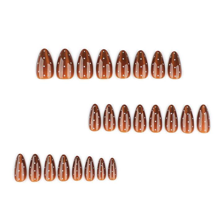 Artful nail extensions with glossy ombre effect and elegant dots Kalsten