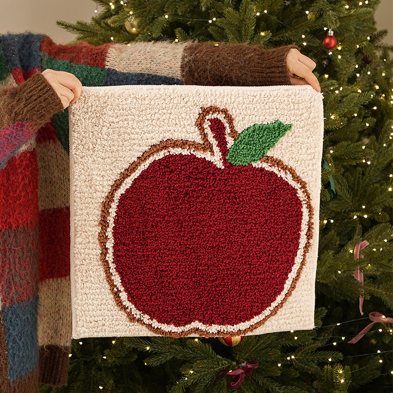 Smaller soft Christmas seat cushion and decoration rug with gingerbread house motif