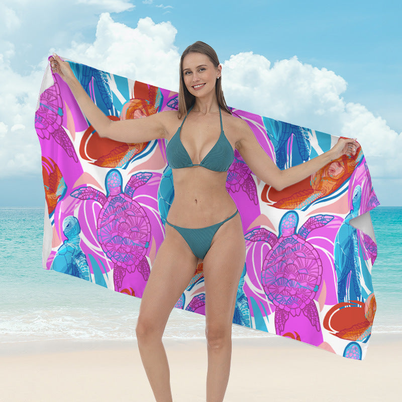 Beach towel with vibrant tropical plant motif Kalsten
