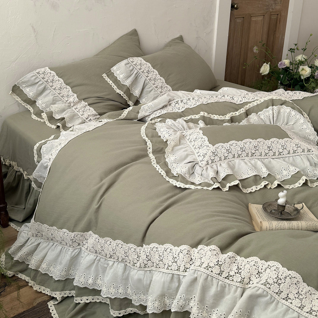 Romantic bedding set in country house style with ruffles and lace trim
