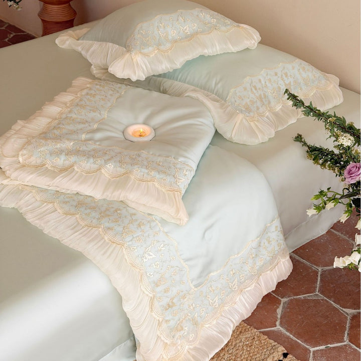 Luxurious satin bedding set with lace and ruffle decoration