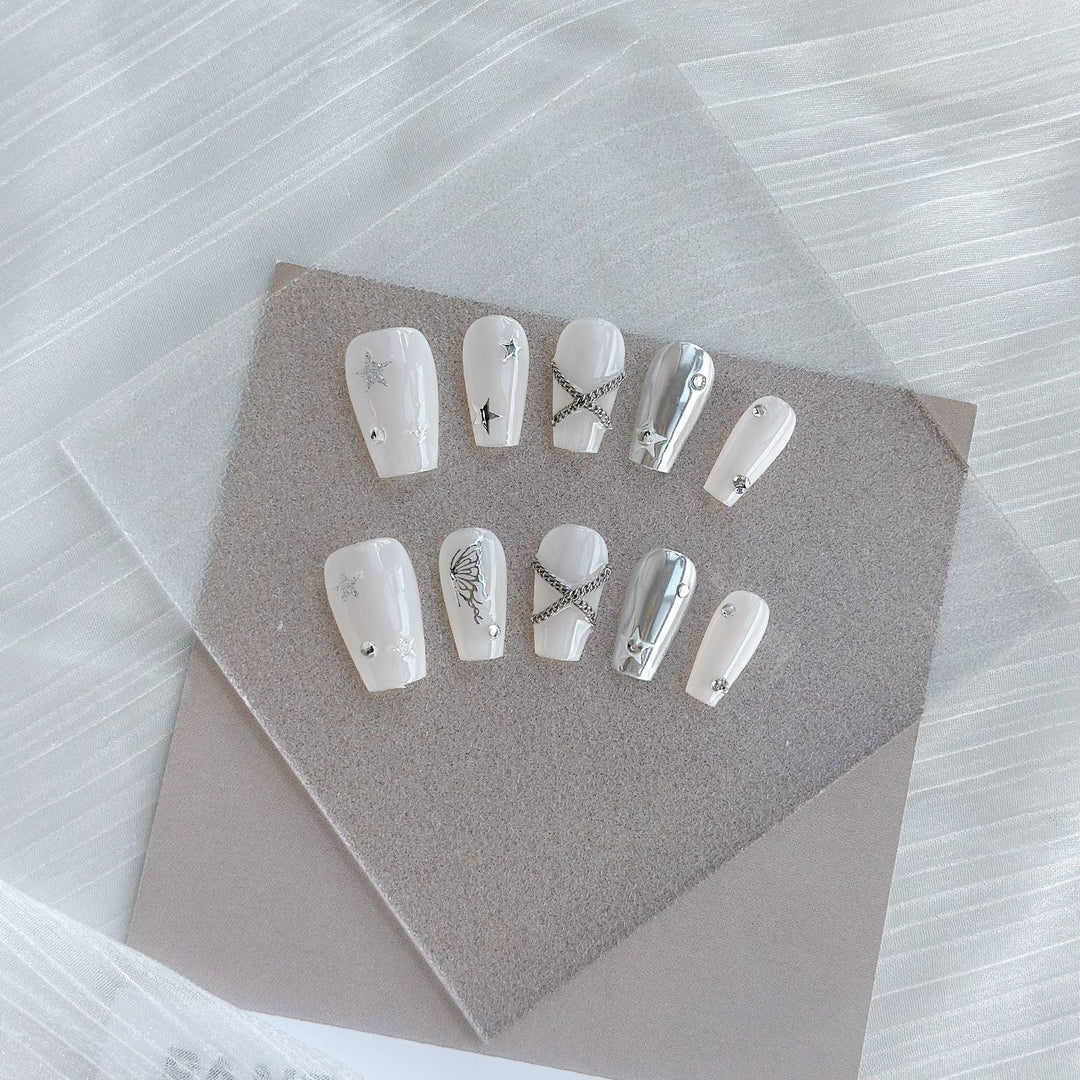 Artistic Press-On Nail Art Set with Heart and Celestial Designs