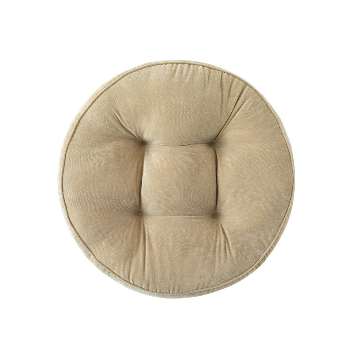 Round padded seat cushion with tufting and soft microfiber cover