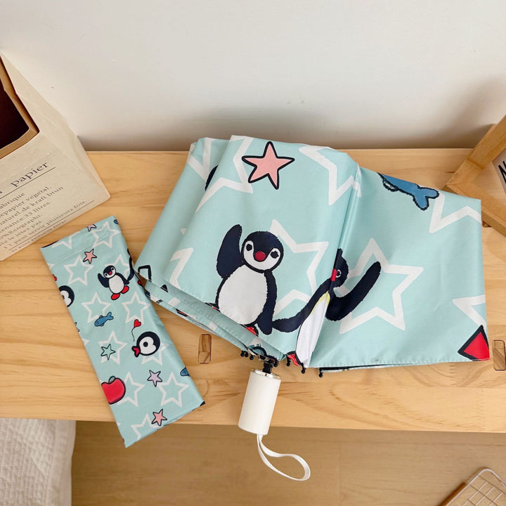 Ladies collapsible umbrella with playful penguin design Kalsten