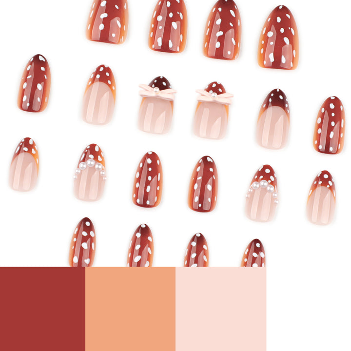 Artificial nail art with dot pattern and bow accents Kalsten