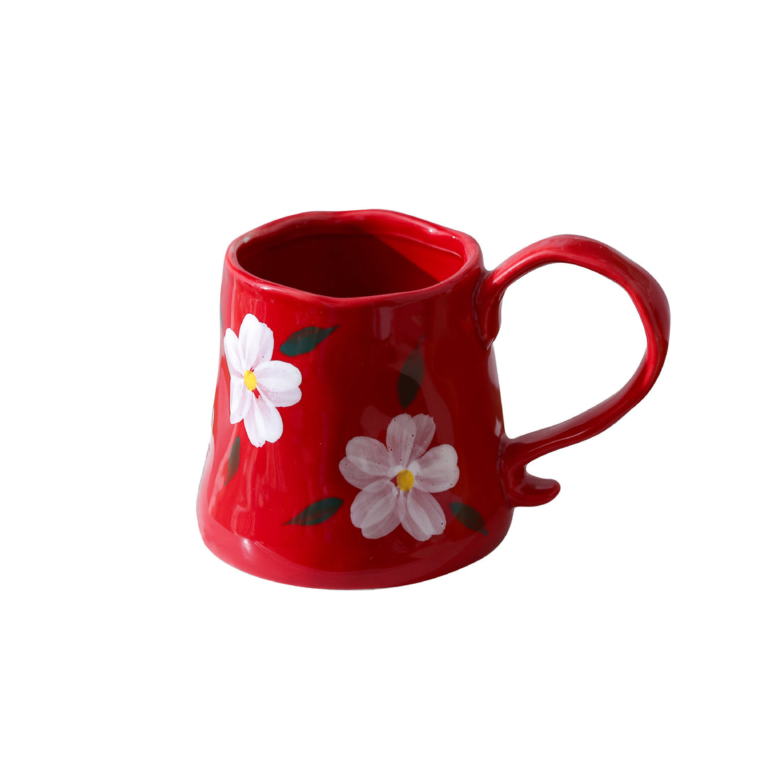 Hand-shaped ceramic mug with cloud relief and organic edge