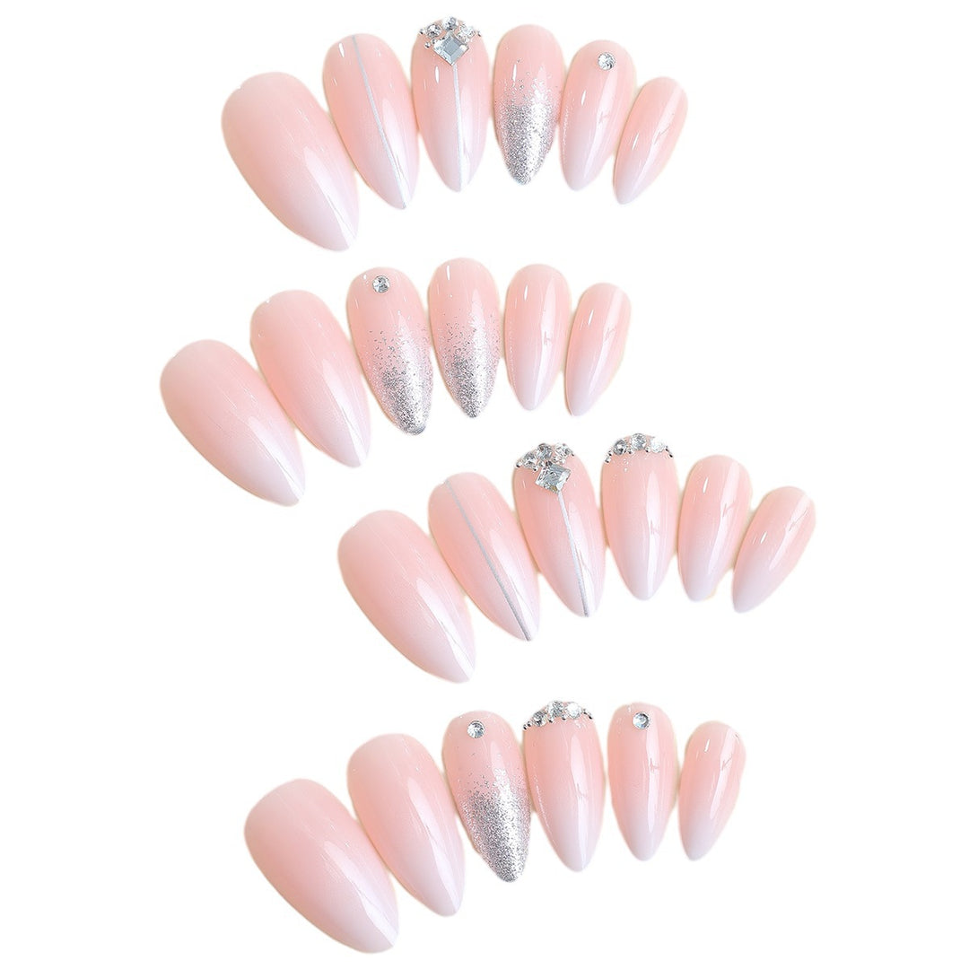 Artificial nail set with elegant glitter and rhinestone accents Kalsten