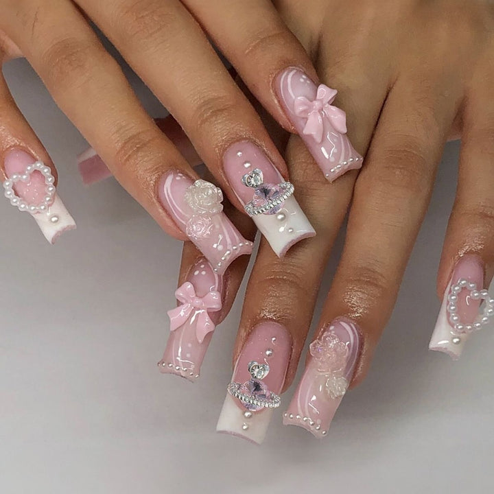 Creative acrylic nail set with delicate pearl and gloss accents Kalsten