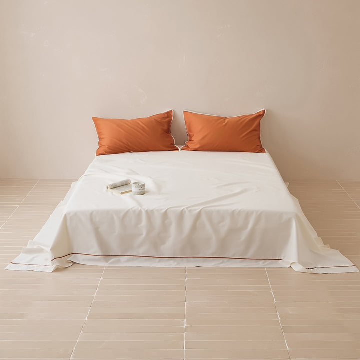 Noble cotton satin bed sheet and pillowcase set with fine piping