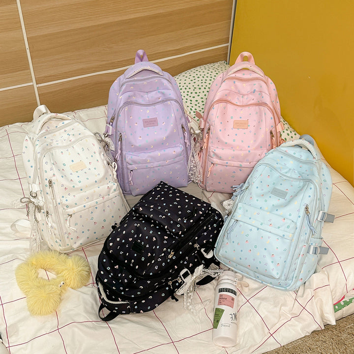 Stylish Multi-Pocket Backpack with Decorative Accents Kalsten