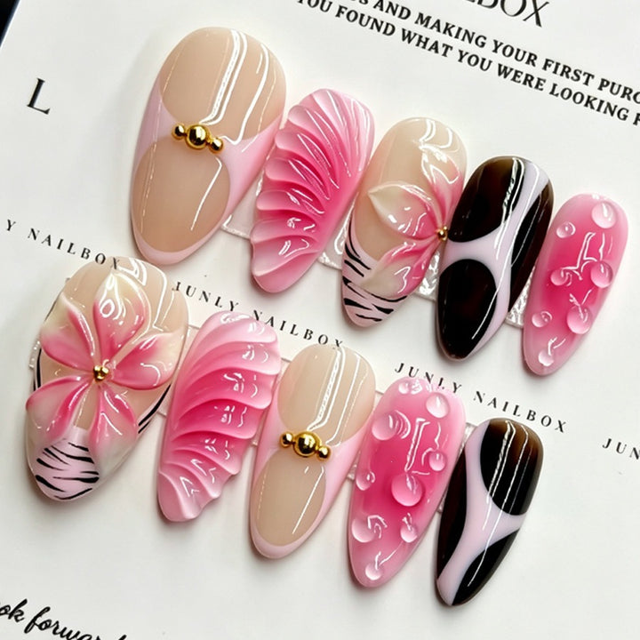 Acrylic nail set with filigree flower and glitter accents Kalsten