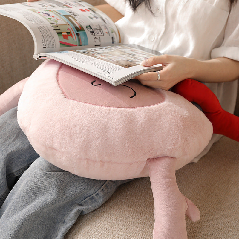 Heart-shaped cuddle castle cushion with attached key and friendly face