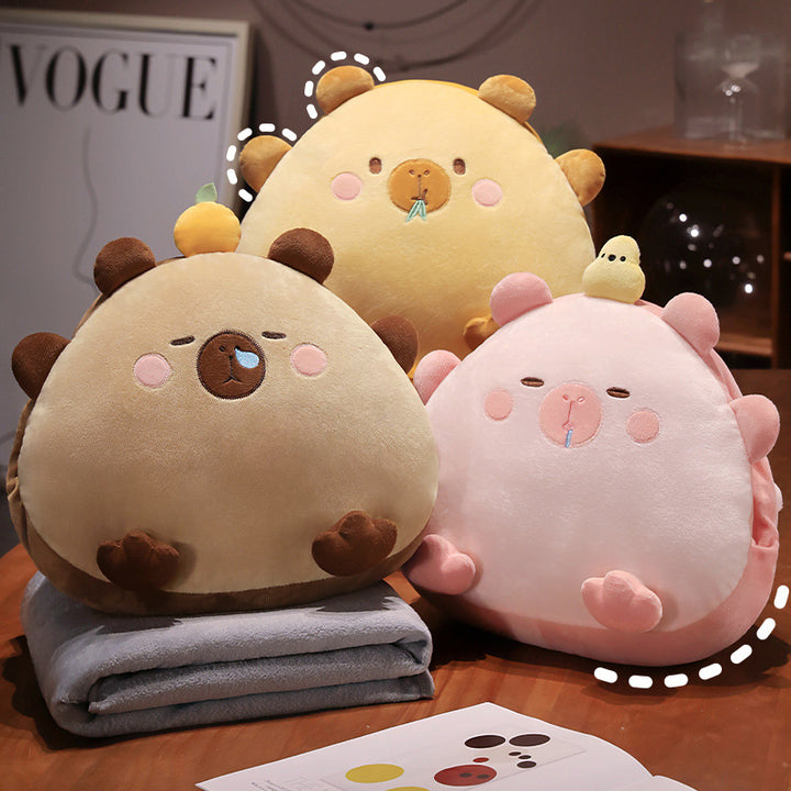Plush cuddle pillow with integrated microfiber throw blanket in cute animal design