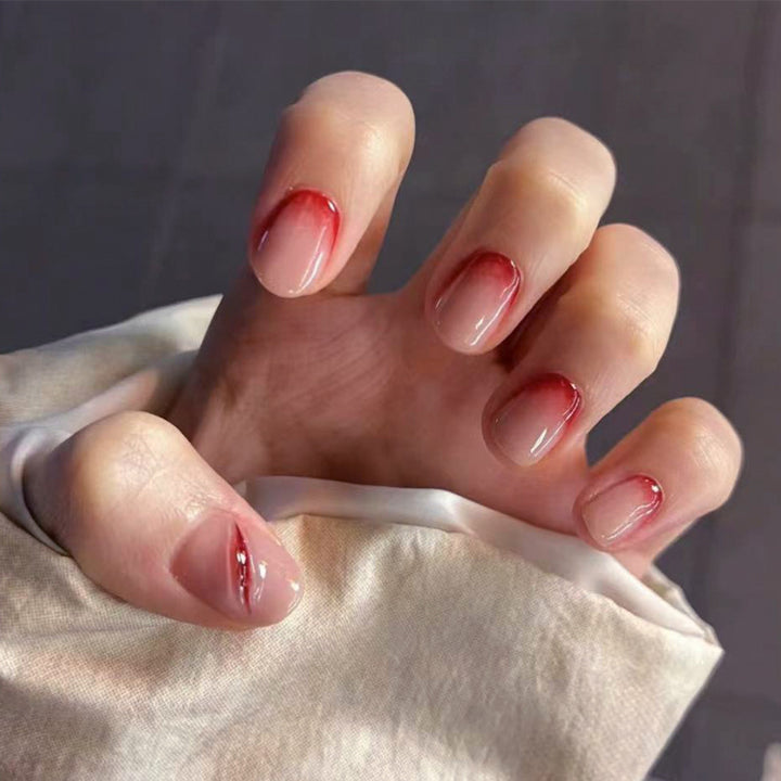 Creative Stiletto Nail Art with Blood Red Accents Kalsten