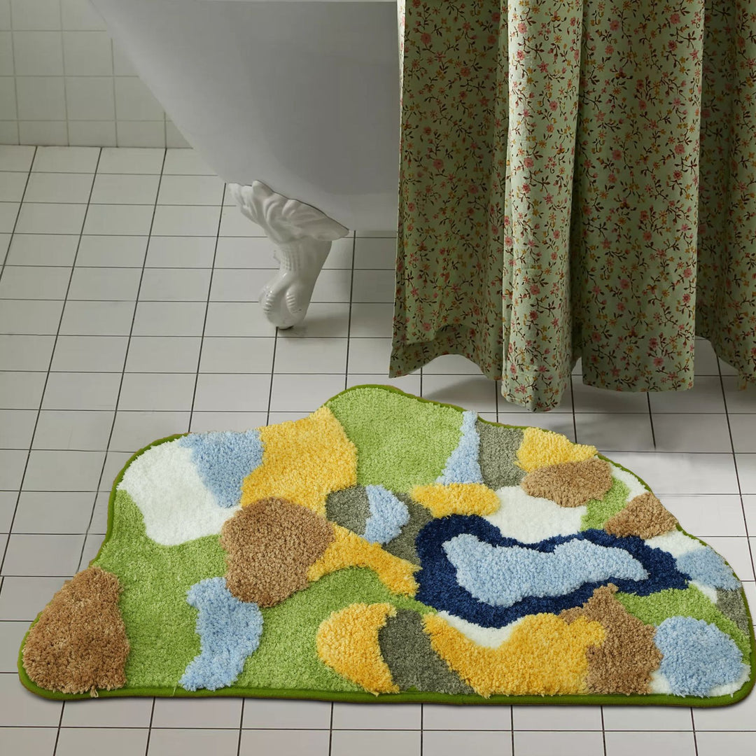 High-pile bath mat with non-slip backing and abstract structural pattern