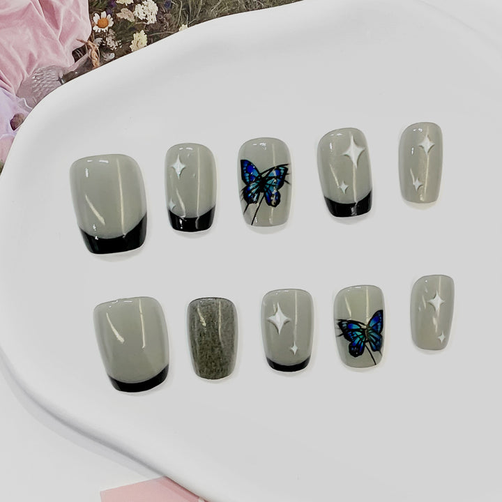 Artistic nail tips with butterfly designs Kalsten