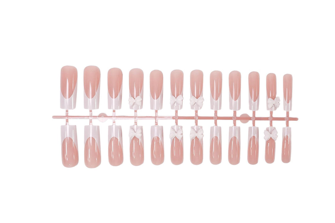 Artificial nail set with shimmering details and cute bows Kalsten