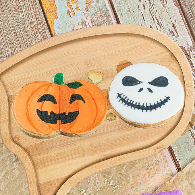 Halloween serving plates made of wood set with pumpkin and ghost shapes