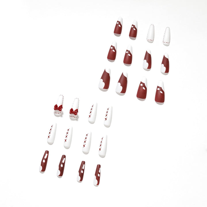 Artful stiletto nails with bow and zigzag design Kalsten