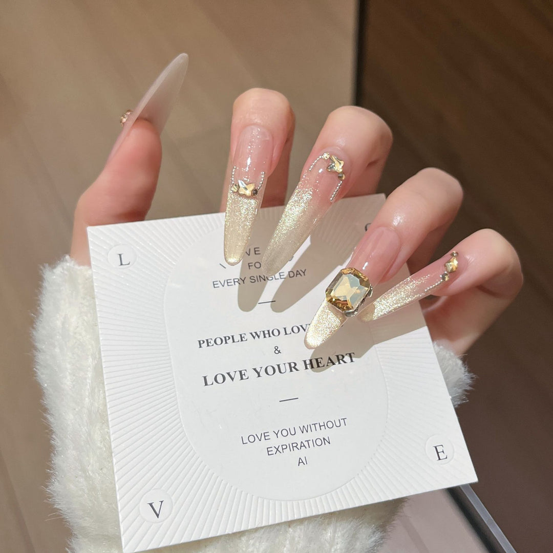 Artistic Stiletto Press-On Nail Art with Glimmering Accents Kalsten