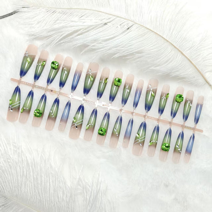 Artificial nails with elegant gradient color and glitter accents Kalsten