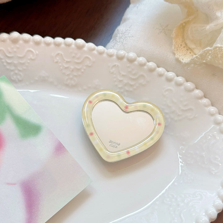 Hand mirror in heart-shaped design Kalsten
