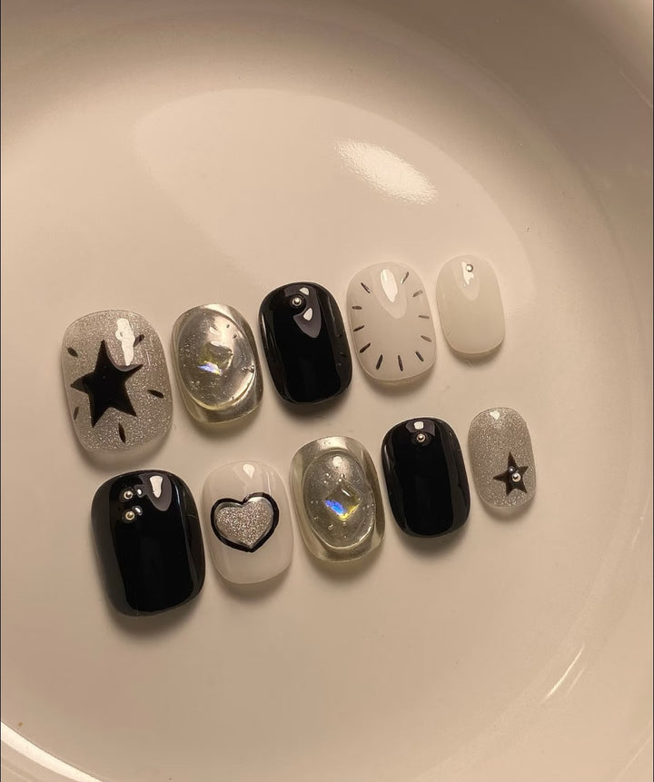 Artistic Press-On Nail Art Set with Geometric and Star Patterns