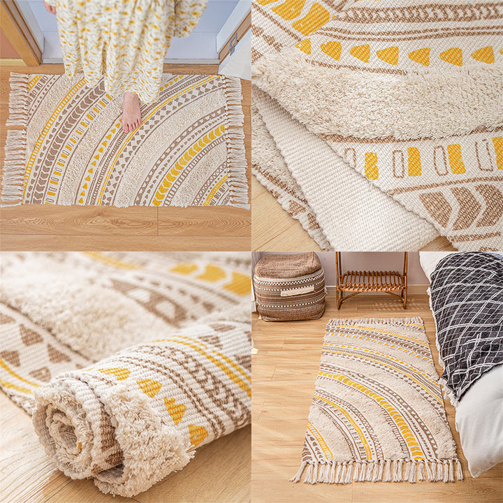 Flat Boho runner rug made of cotton blend fabric with geometric hexagon tufting and decorative fringed edge.