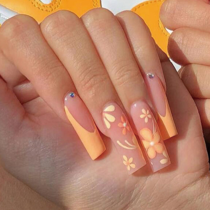 Artistic Nail Art with Floral and Creative Design Kalsten