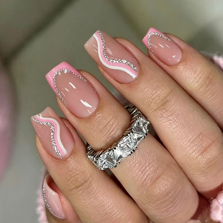 Artificial nails with elegant wave design and glitter accents Kalsten