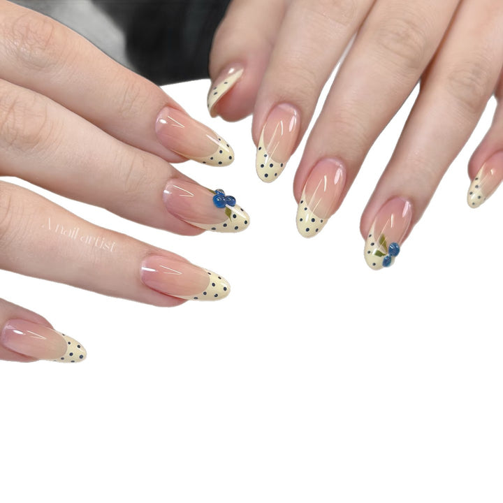 Artistic Press-On Nail Art Set with Polka Dot and Blue Gem Accents