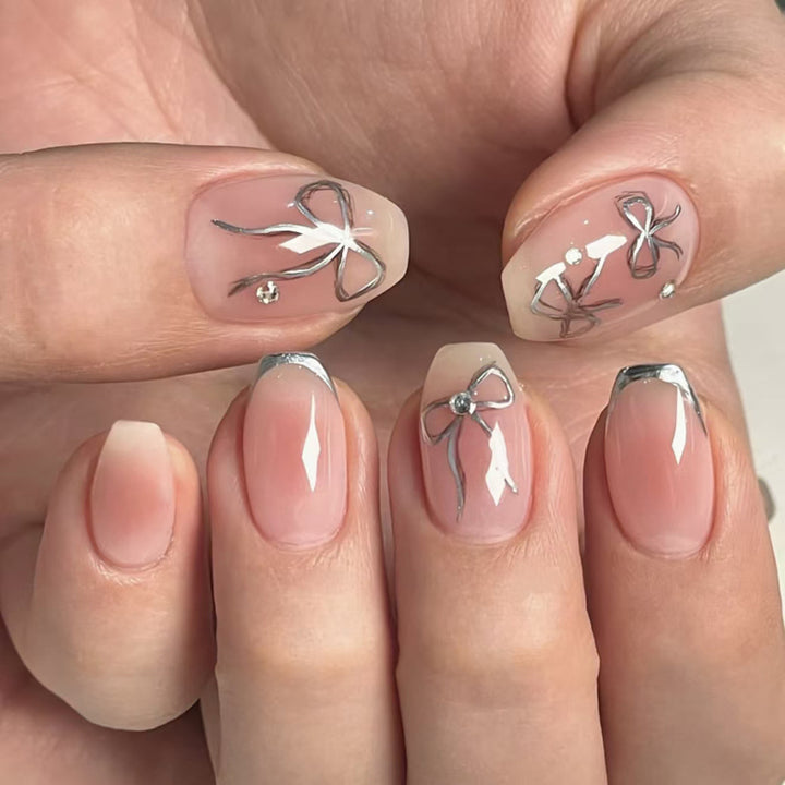 Artful Nail Art with Bow Design Kalsten