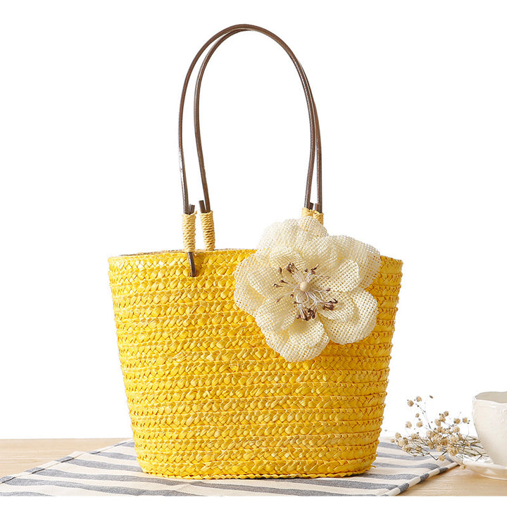 Elegant bast bag with flower appliqué Kalsten