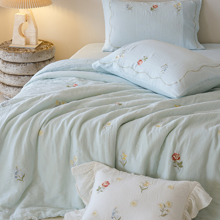 Light cotton gauze bedding set with fine floral embroidery and ruffle trim
