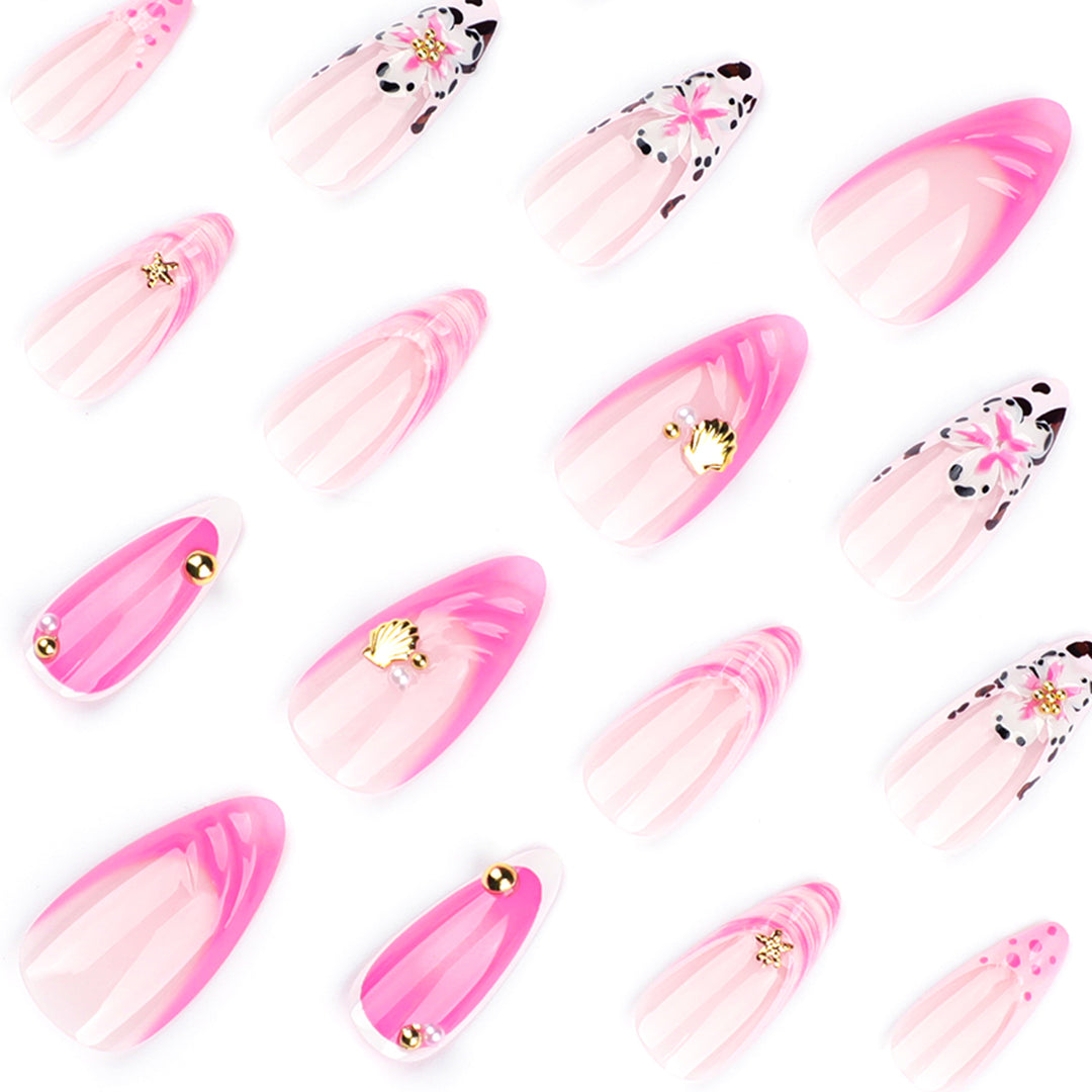 Artistic nail extensions with floral accents and glitter Kalsten