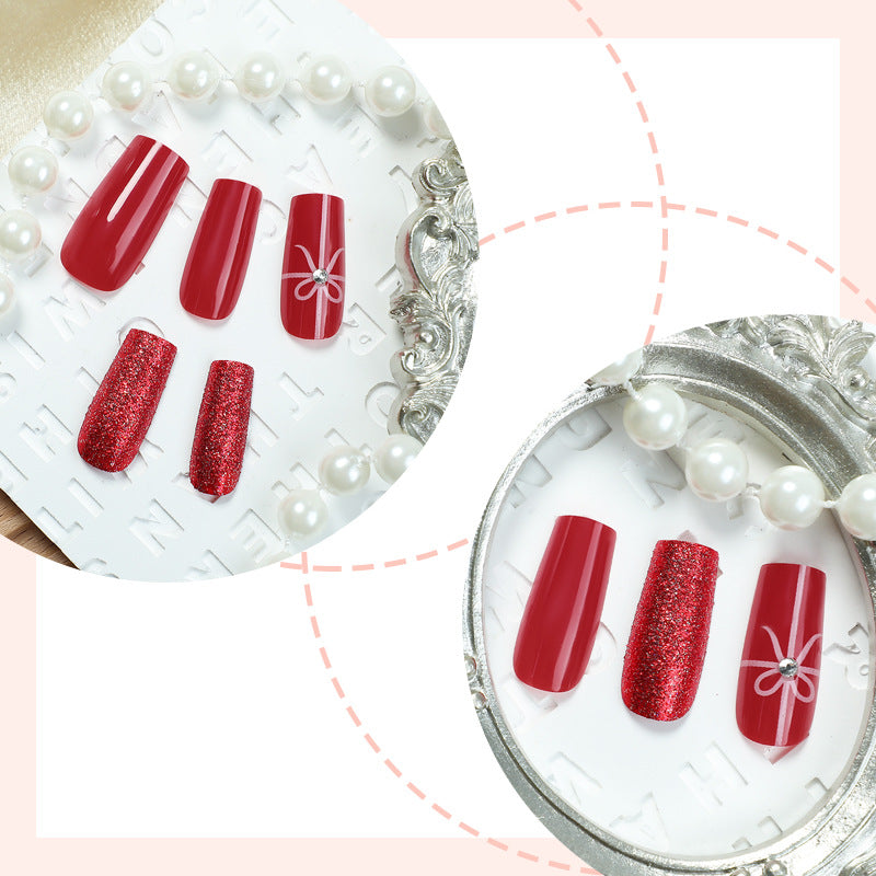 Creative acrylic nail set with glitter and bow designs Kalsten