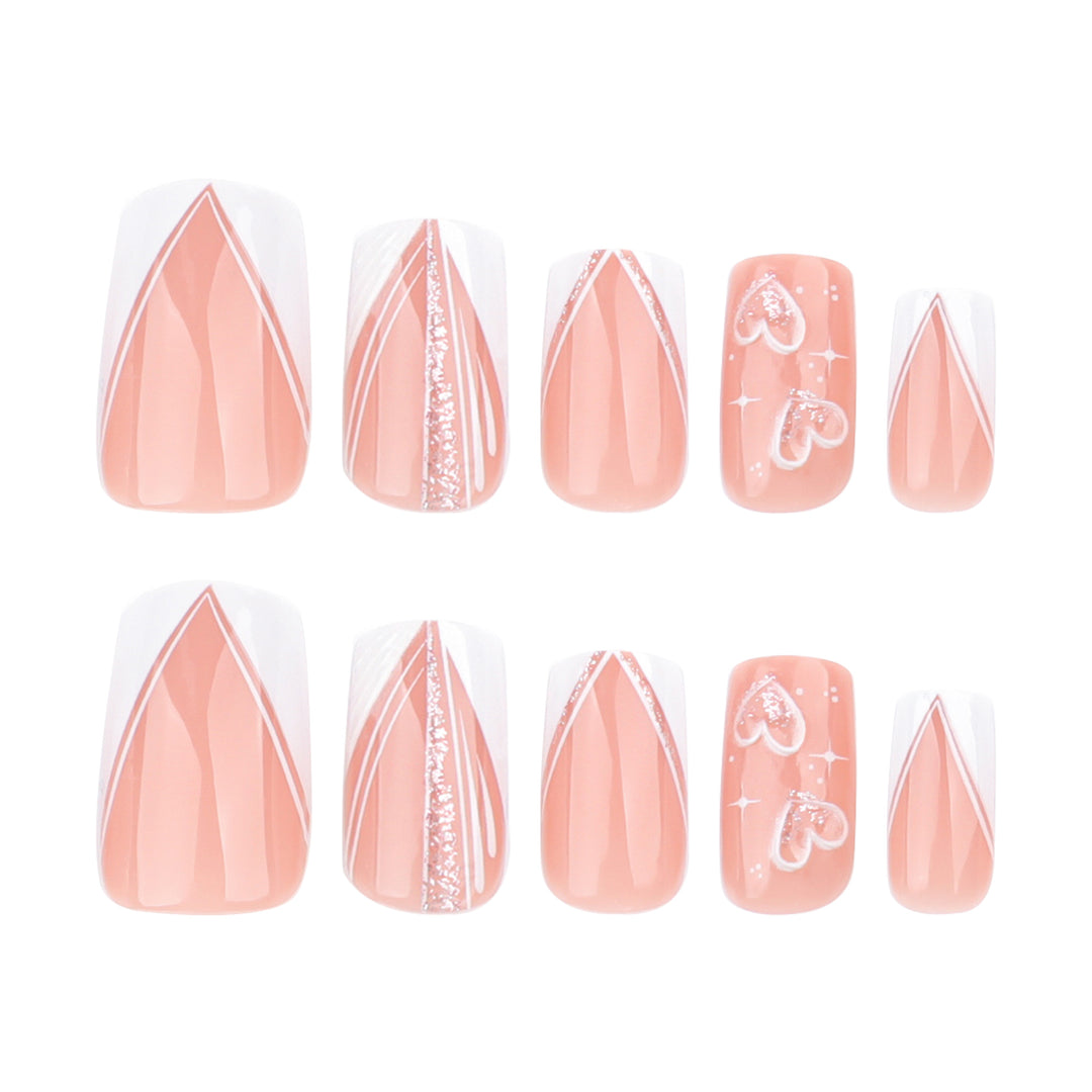 Artful Nail Art with Heart Design and Glitter Effects Kalsten
