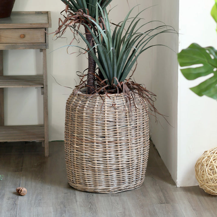 Stylish laundry basket made of braided natural material Kalsten