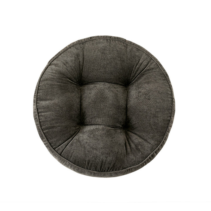 Round padded seat cushion with tufting and soft microfiber cover